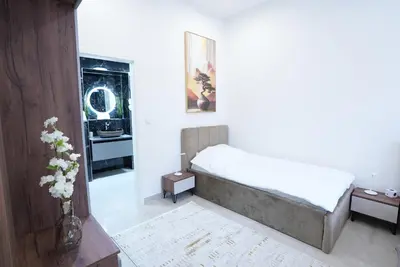 Ein Bett oder Betten in einem Zimmer der Unterkunft Luxury Apartments - Wohnung IC - Luxus-Apartment