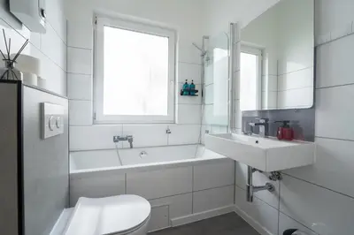 Ein Badezimmer in der Unterkunft STAYDIA Zentrales Apartment nahe Münzplatz