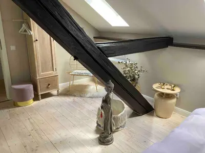Ein Bett oder Betten in einem Zimmer der Unterkunft Historisches Designer Loft Namaste