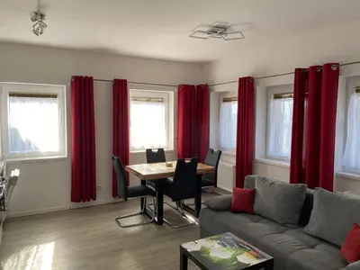 Ein Sitzbereich in der Unterkunft Race & Rest Apartments