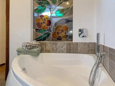 Ein Badezimmer in der Unterkunft Harreshof