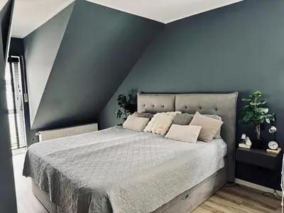 Ein Bett oder Betten in einem Zimmer der Unterkunft Große Doppelhaushälfte mit Sauna, Pool & Garten