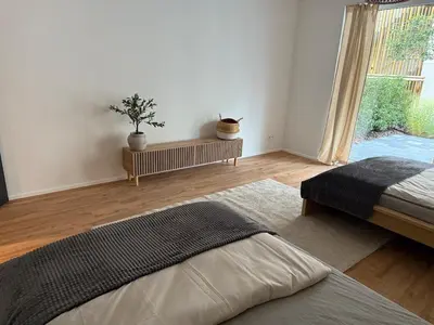 Ein Bett oder Betten in einem Zimmer der Unterkunft KaiserLogen Wellness