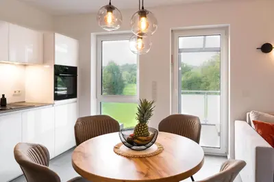 Küche/Küchenzeile in der Unterkunft Premiumzeit Pure Apartment Bostalsee mit Infrarotkabine