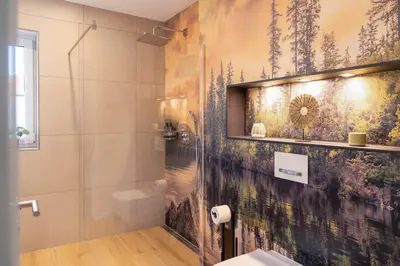 Ein Badezimmer in der Unterkunft Premiumzeit Pure Apartment Bostalsee mit Infrarotkabine