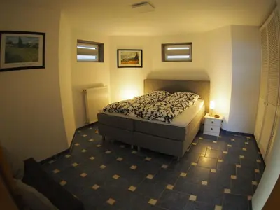 Ein Bett oder Betten in einem Zimmer der Unterkunft Am Waldrand
