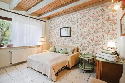 Ein Bett oder Betten in einem Zimmer der Unterkunft Südhöhe-Domizil