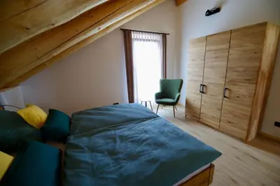 Ein Bett oder Betten in einem Zimmer der Unterkunft Blockhaus Eifelstern