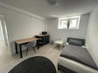 Ein Sitzbereich in der Unterkunft ABC Ferienwohnung Zimmer mit Kochmöglichkeit