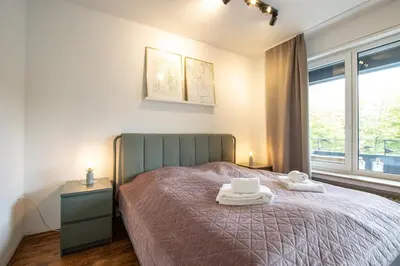 Ein Bett oder Betten in einem Zimmer der Unterkunft Schöne Wohnung mit großer Terrasse und Moselblick