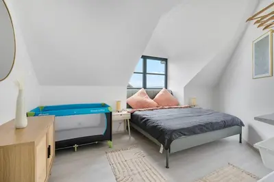 Ein Bett oder Betten in einem Zimmer der Unterkunft Ruheoase im naturnahem Kurort