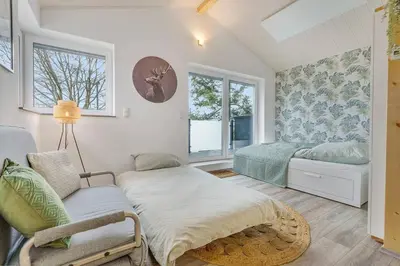 Ein Bett oder Betten in einem Zimmer der Unterkunft Wunderschönes Ferienhaus im Grünen