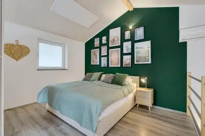 Ein Bett oder Betten in einem Zimmer der Unterkunft Wunderschönes Ferienhaus im Grünen