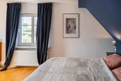 Ein Bett oder Betten in einem Zimmer der Unterkunft Romantic old building villa near Nürburgring