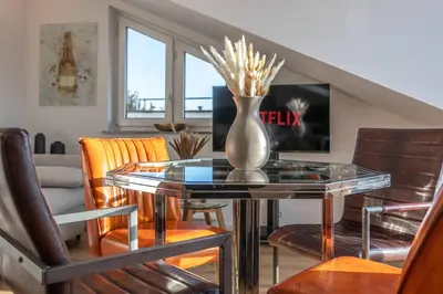 Ein Sitzbereich in der Unterkunft Apartment close to nature with balcony view