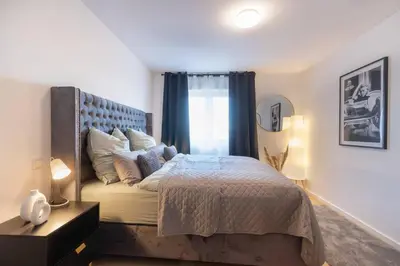 Ein Bett oder Betten in einem Zimmer der Unterkunft Apartment close to nature with balcony view