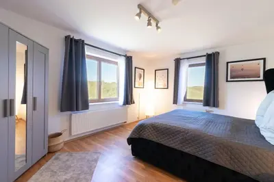 Ein Bett oder Betten in einem Zimmer der Unterkunft Living between heaven and forest