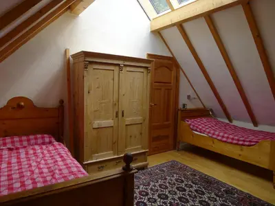 Ein Bett oder Betten in einem Zimmer der Unterkunft Ferienhaus Schmelzmühle
