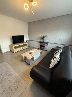 TV/Unterhaltungsangebot in der Unterkunft Apartment 61 - Ideal für Geschäfts- & Urlaubsreisen 90 m2