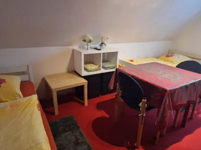 Ein Bett oder Betten in einem Zimmer der Unterkunft HOTEL GÄSTEHAUS AM Fels