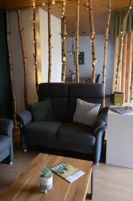 Ein Sitzbereich in der Unterkunft Familiennest-Eifel