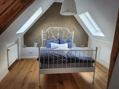 Ein Bett oder Betten in einem Zimmer der Unterkunft Ferienhaus Anne