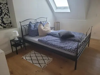 Ein Bett oder Betten in einem Zimmer der Unterkunft Ferienhaus Anne