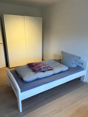 Ein Bett oder Betten in einem Zimmer der Unterkunft Moselfreunde Ellenz-Poltersdorf