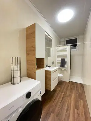 Ein Bett oder Betten in einem Zimmer der Unterkunft Gemütliches DG-Apartment in Weißenthurm, Wohnung 4