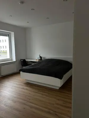 Ein Bett oder Betten in einem Zimmer der Unterkunft Gemütliches Zimmer im Herzen der Stadt Neuwied