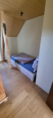 Ein Bett oder Betten in einem Zimmer der Unterkunft Ferien auf dem Lande
