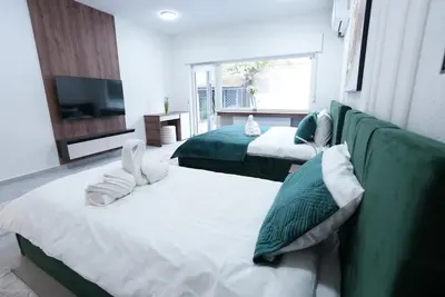 Ein Bett oder Betten in einem Zimmer der Unterkunft Luxury Apartments - Wohnung IC - Familienfreundliches