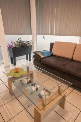 Ein Sitzbereich in der Unterkunft Ferienwohnung Keppeln