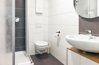 Ein Badezimmer in der Unterkunft RheinGold Apartment I Bingen City