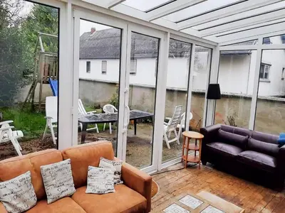 Ein Sitzbereich in der Unterkunft Eifel Garden Villa for Groups