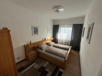 Ein Bett oder Betten in einem Zimmer der Unterkunft Safran Ferienwohnung