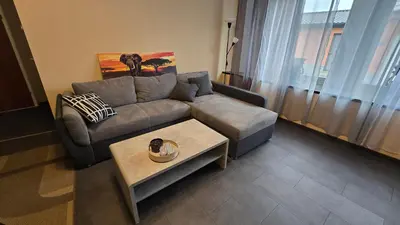 Ein Sitzbereich in der Unterkunft Geluk in Bettingen 1