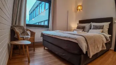 Ein Bett oder Betten in einem Zimmer der Unterkunft Waldherberge Sargenroth