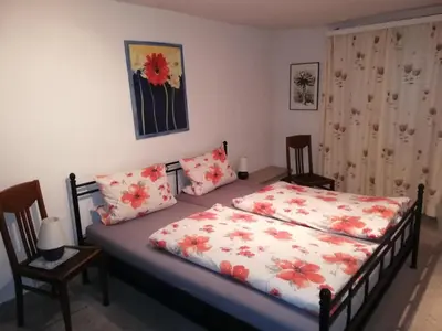 Ein Bett oder Betten in einem Zimmer der Unterkunft Weingut Steffen Erben