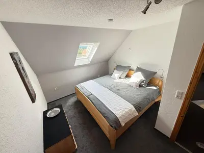 Ein Bett oder Betten in einem Zimmer der Unterkunft Ferienwohnung HAWELA