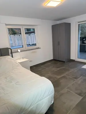 Ein Bett oder Betten in einem Zimmer der Unterkunft Moderne 80qm mit Terrasse, Wlan und Parkplatz - Nähe Nürburgring