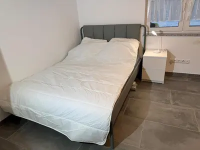 Ein Bett oder Betten in einem Zimmer der Unterkunft Moderne 80qm mit Terrasse, Wlan und Parkplatz - Nähe Nürburgring
