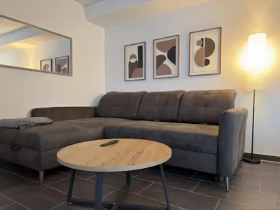 Ein Sitzbereich in der Unterkunft FeWoMo Panorama Loft, Mosel Promenade Cochem ,Moselblick, Burgblick, barrierefrei, bis 6 Personen