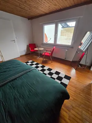 Ein Bett oder Betten in einem Zimmer der Unterkunft GreenHell Stays - Nürburgring
