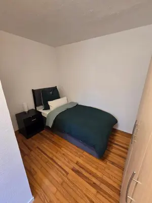 Ein Bett oder Betten in einem Zimmer der Unterkunft GreenHell Stays - Nürburgring