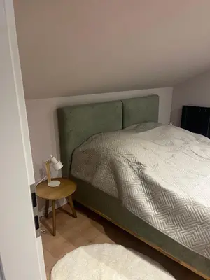 Ein Bett oder Betten in einem Zimmer der Unterkunft Eifellust