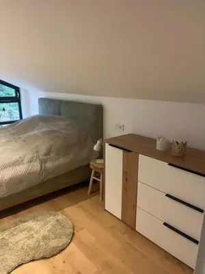 Ein Bett oder Betten in einem Zimmer der Unterkunft Eifellust