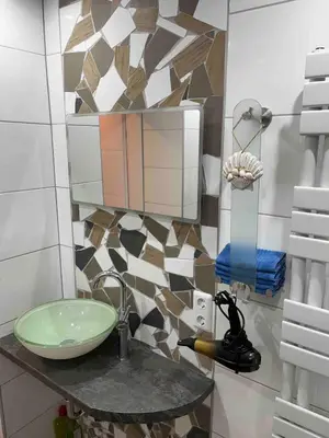 Ein Badezimmer in der Unterkunft Nordschleife Apartments A2