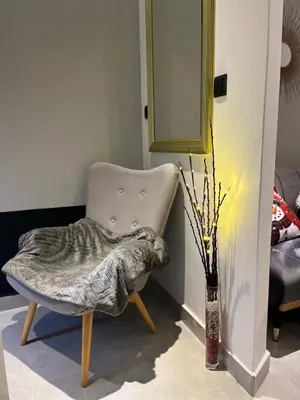 Ein Sitzbereich in der Unterkunft Riverside-Appartements
