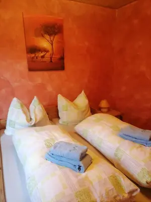 Ein Bett oder Betten in einem Zimmer der Unterkunft Haus Sonne